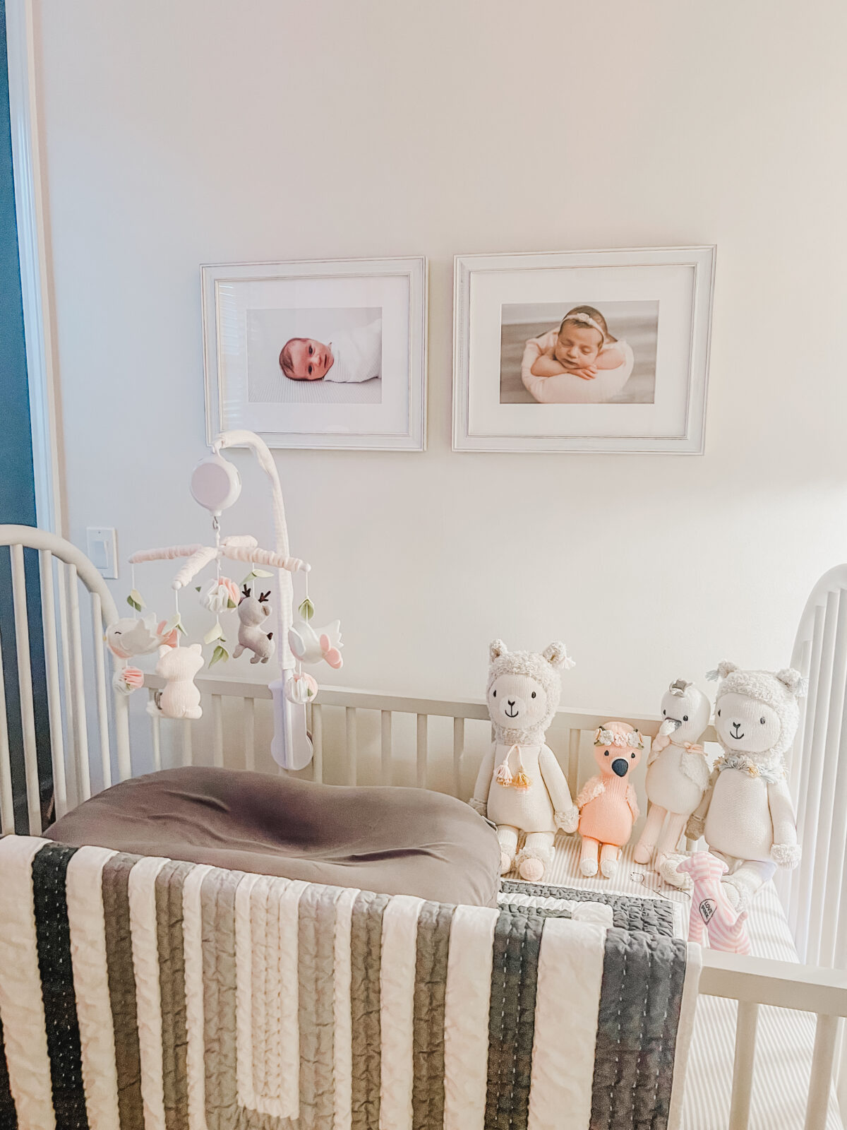 Custom artwork installation of a newborn framed wall gallery