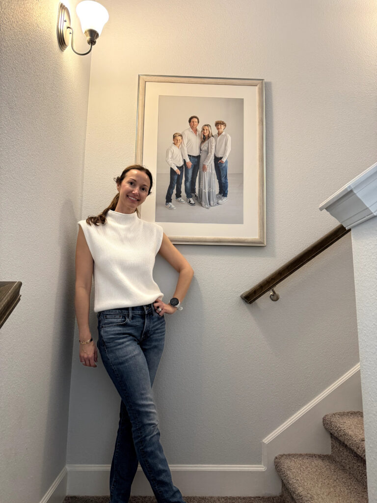 Installation of a statement framed print custom artwork