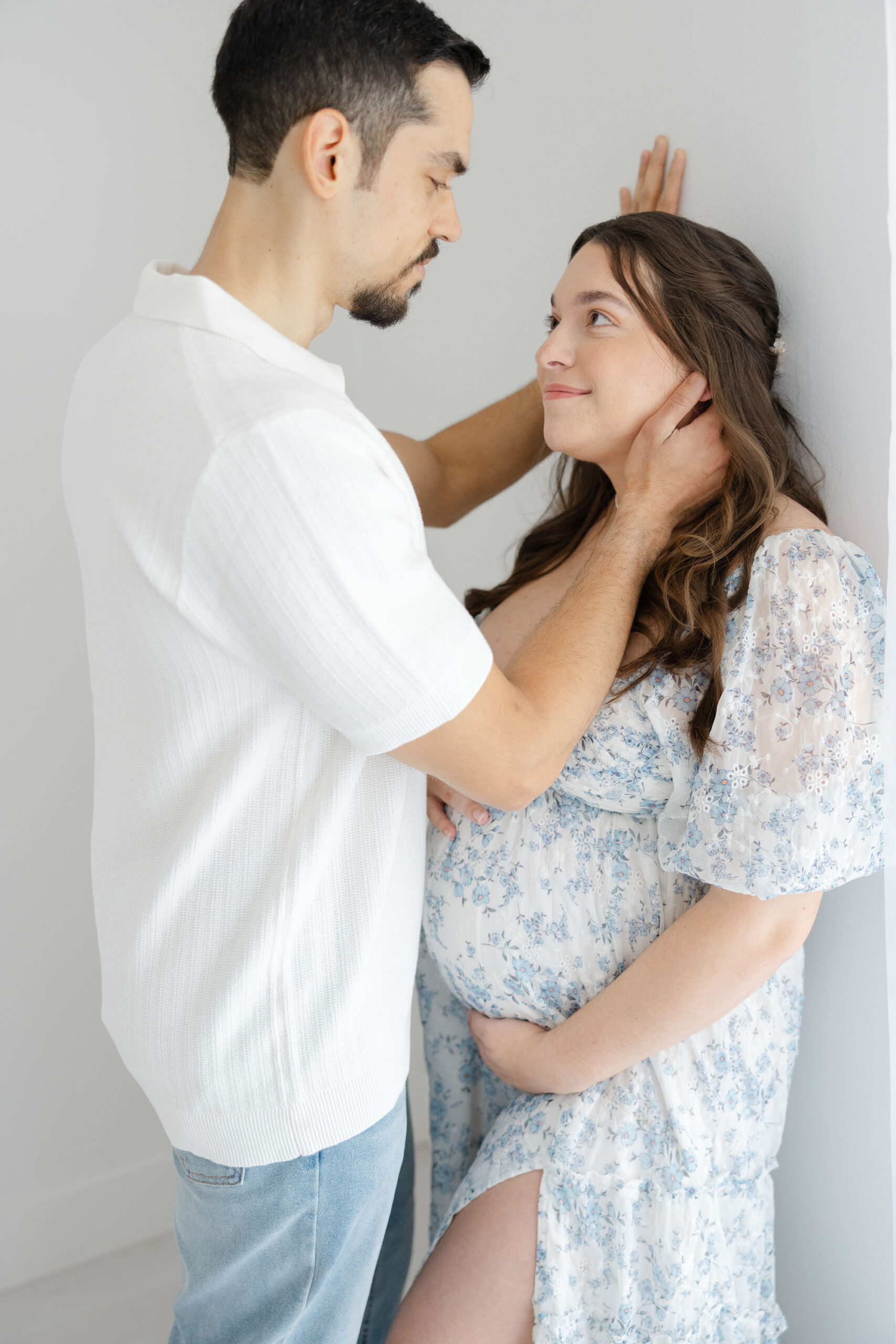 Couple maternity photo in Jacksonville studio setting